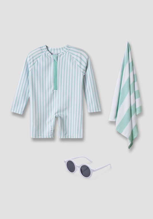 Striped swimsuit with towel and sunglasses
