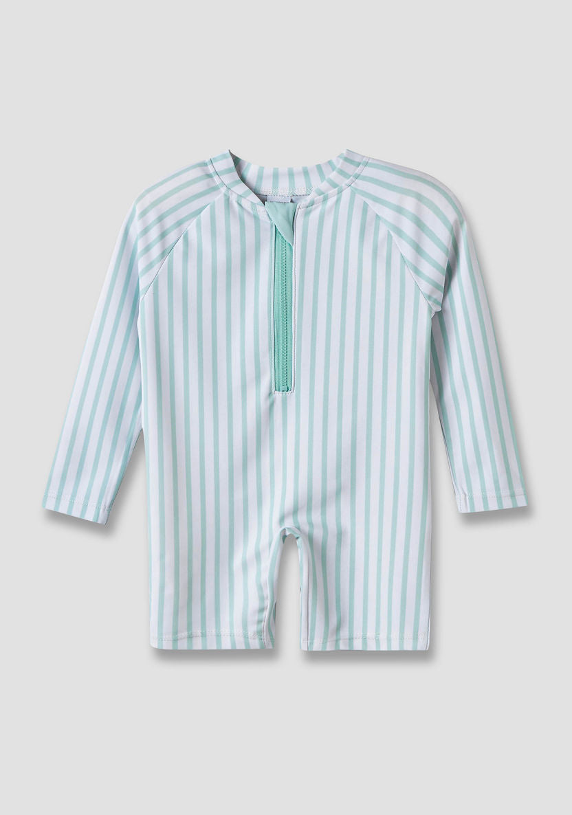 Striped swimsuit with towel and sunglasses